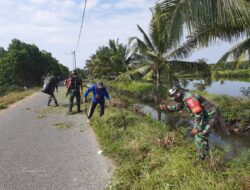 Koramil 1403-15/Malili bersama Masyarakat Desa Tampina  laksanakan Karya Bhakti